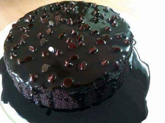 Decadent Malaysian chocolate steamed cake with rich ganache topping